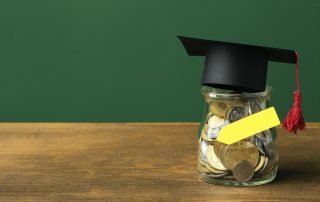 front-view-jar-with-coins-academic-cap