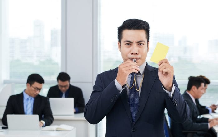 Asian Entrepreneur Showing Yellow Card - Oasis Credit